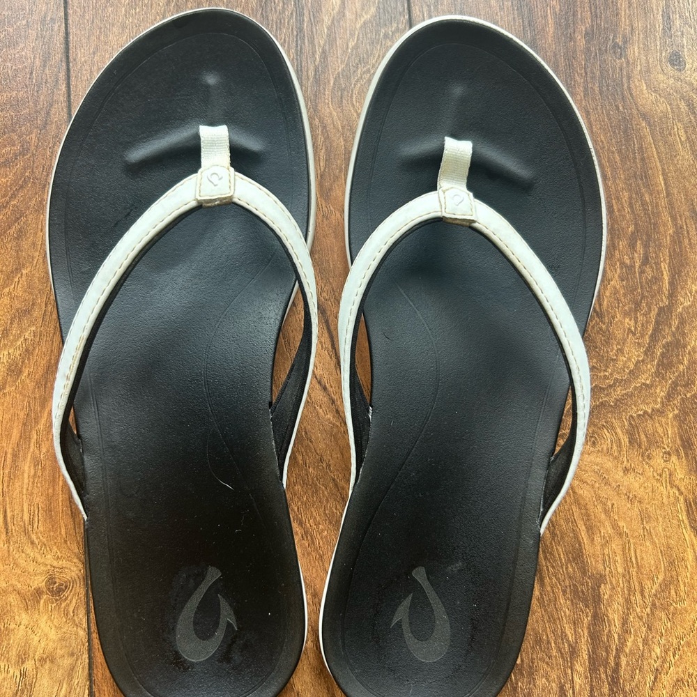 OluKai Black and Cream Women's Sandals
